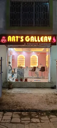Illuminated gallery signage at night